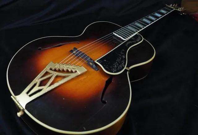 1933 年的 D'Angelico 拱面吉他(序號 1034),原主是大樂團吉他手 Andy Jackson