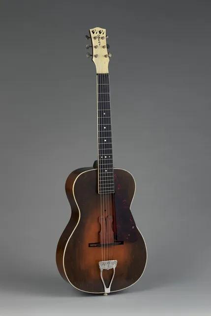 約 1933 年密西根州卡拉馬祖 Vivi-Tone 製作的插電吉他,大都會藝術博物館收藏。